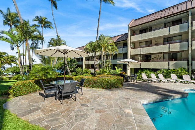 view of swimming pool featuring a patio