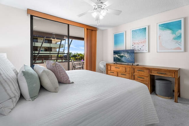 bedroom with carpet, ceiling fan, and access to exterior