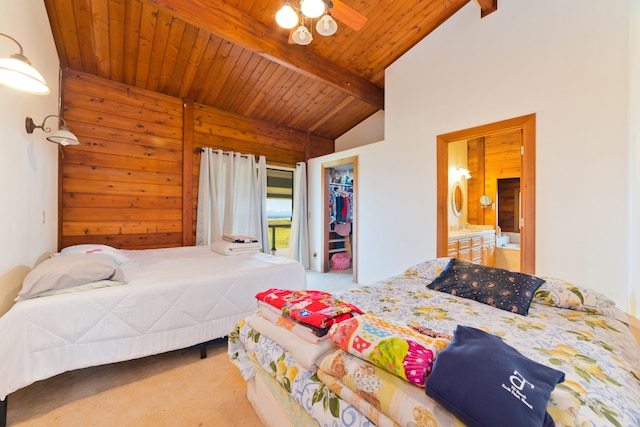 carpeted bedroom featuring connected bathroom, vaulted ceiling with beams, wood walls, a closet, and wood ceiling