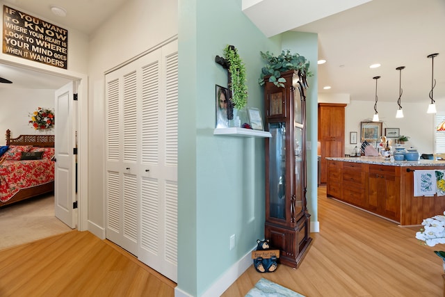 hall featuring light hardwood / wood-style flooring