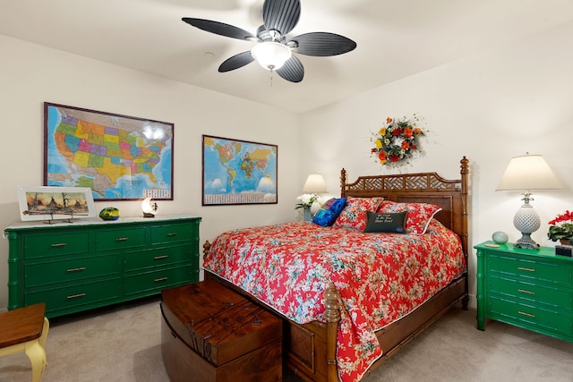 bedroom with ceiling fan and light carpet