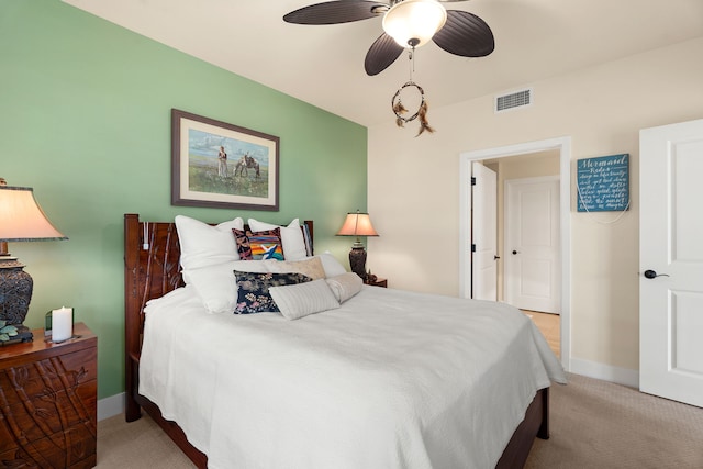 bedroom featuring ceiling fan and light colored carpet