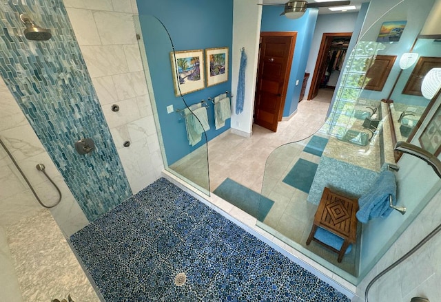 bathroom featuring tiled shower