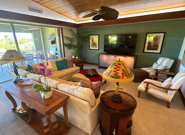 living room featuring carpet floors, ceiling fan, and lofted ceiling