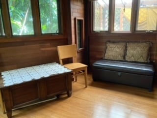 bedroom with light hardwood / wood-style flooring and multiple windows