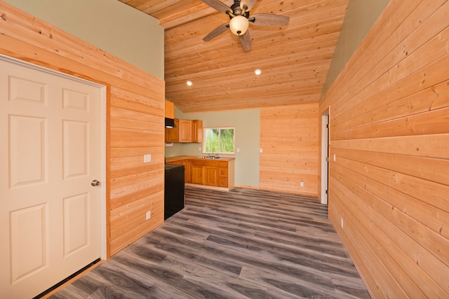 kitchen with wood walls, ceiling fan, vaulted ceiling, dark hardwood / wood-style flooring, and wood ceiling