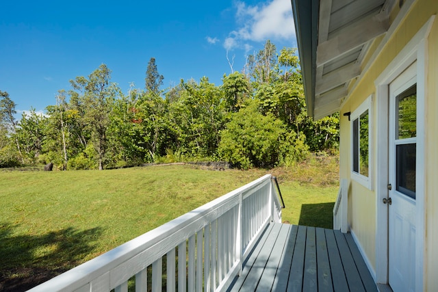 wooden deck with a yard