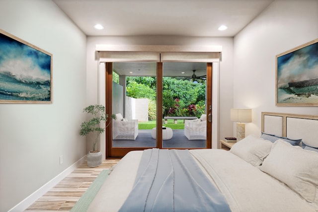 bedroom featuring access to outside and light hardwood / wood-style floors