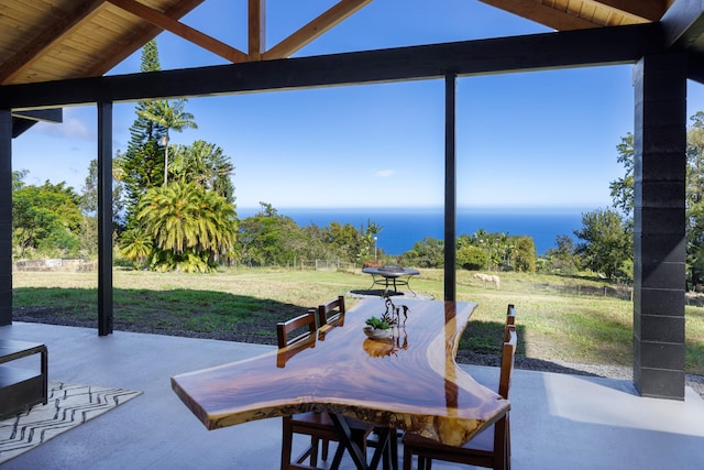 view of patio / terrace with a water view