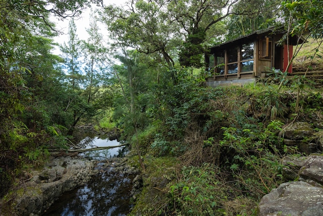 view of yard with a water view