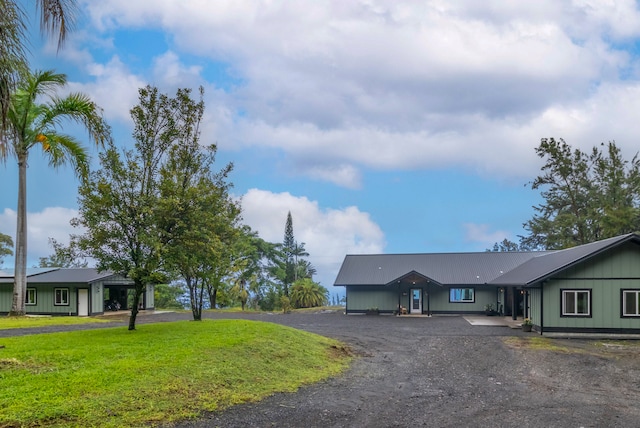 view of front of property with a front lawn