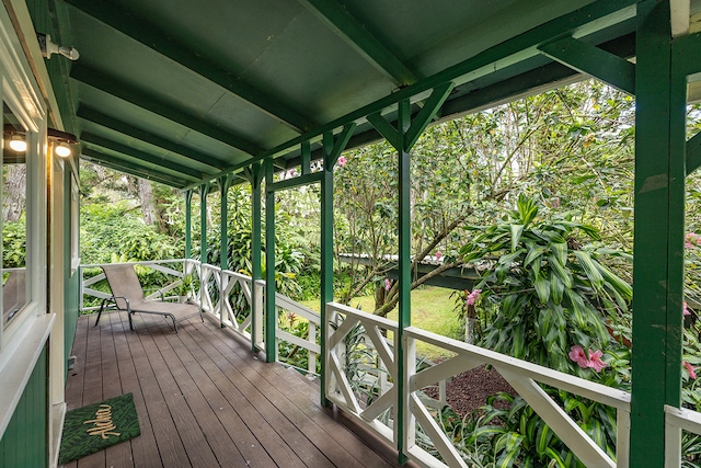 wooden terrace with a porch