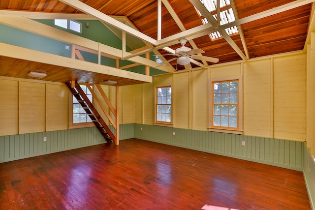 spare room featuring hardwood / wood-style floors, wooden ceiling, and lofted ceiling