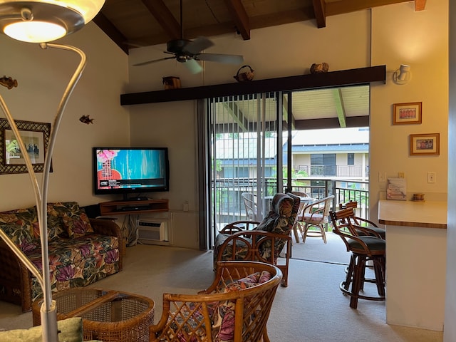 living room featuring beamed ceiling, ceiling fan, and light carpet