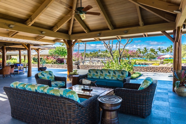 view of patio / terrace featuring a gazebo, outdoor lounge area, and ceiling fan