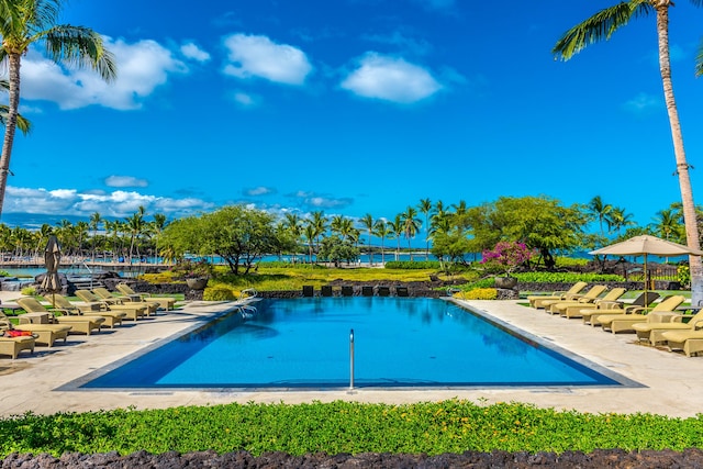 69-1000 Kolea Kai Cir Unit 9E, Waikoloa, HI 96738 - community pool with a patio area