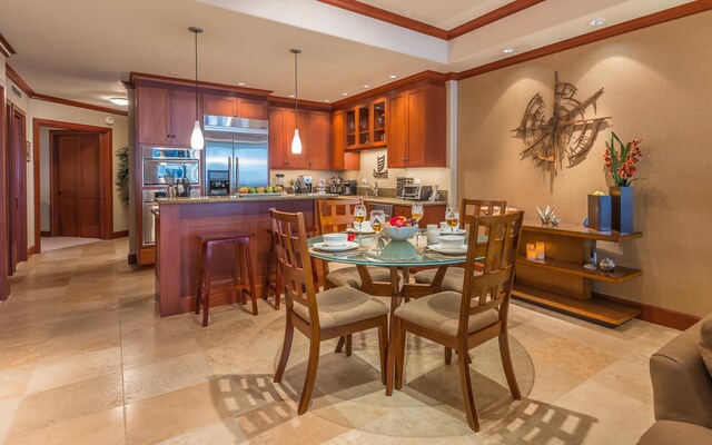 69-1000 Kolea Kai Cir Unit 9E, Waikoloa, HI 96738 - dining area featuring crown molding and recessed lighting