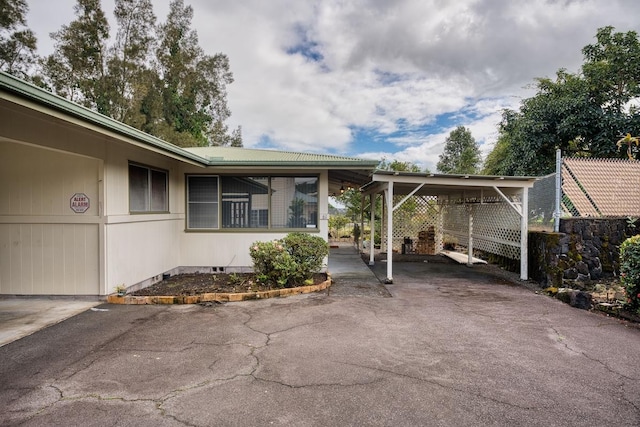 view of patio / terrace with a carport