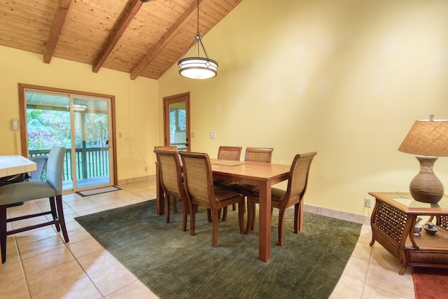 tiled dining room with beam ceiling, high vaulted ceiling, and wooden ceiling