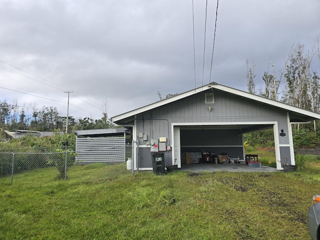 detached garage with fence