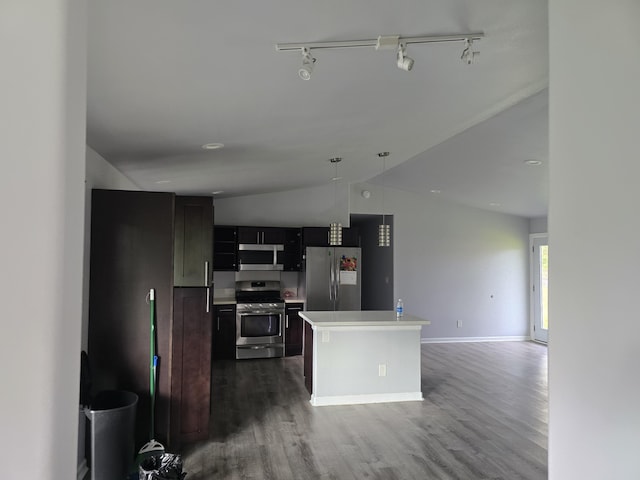 kitchen with a kitchen island, open floor plan, stainless steel appliances, light countertops, and pendant lighting