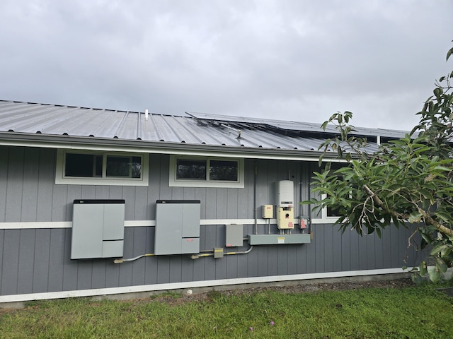 view of property exterior with metal roof