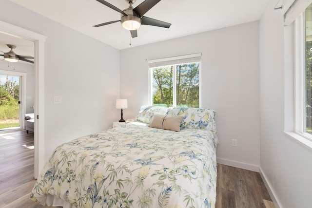 bedroom featuring ceiling fan and hardwood / wood-style flooring