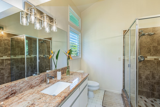 bathroom with walk in shower, tile patterned floors, lofted ceiling, toilet, and vanity