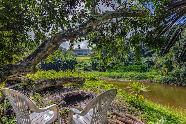 view of patio / terrace with a water view