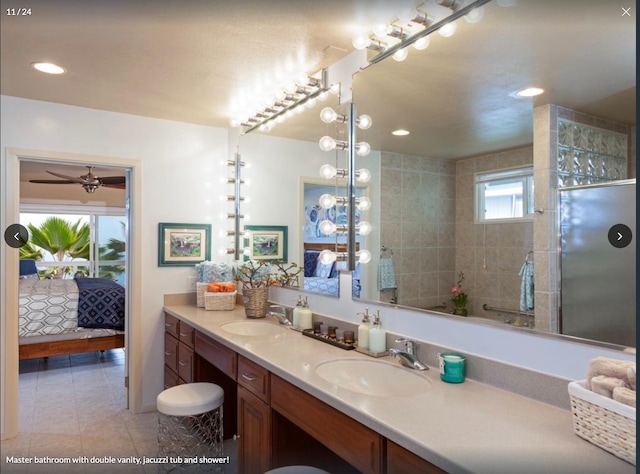 bathroom featuring tile patterned floors and vanity