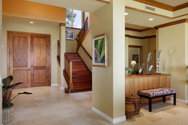 entrance foyer with ornamental molding