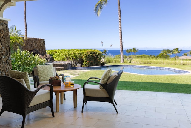 exterior space featuring a water view and a yard