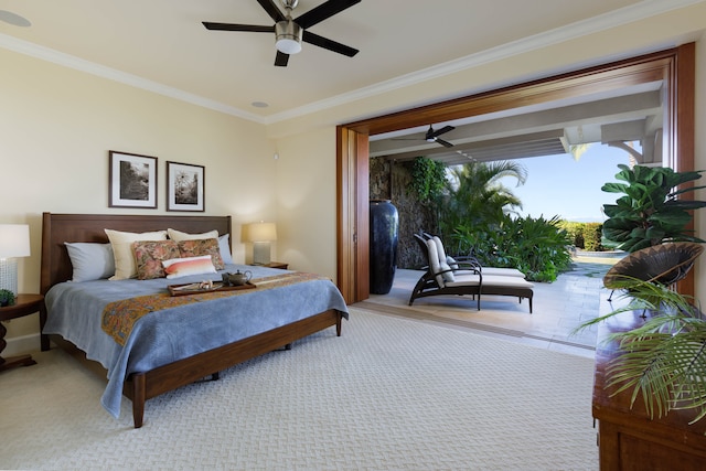 bedroom with ceiling fan, light colored carpet, and crown molding