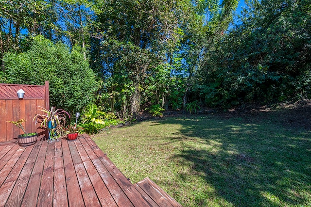 view of yard with a wooden deck