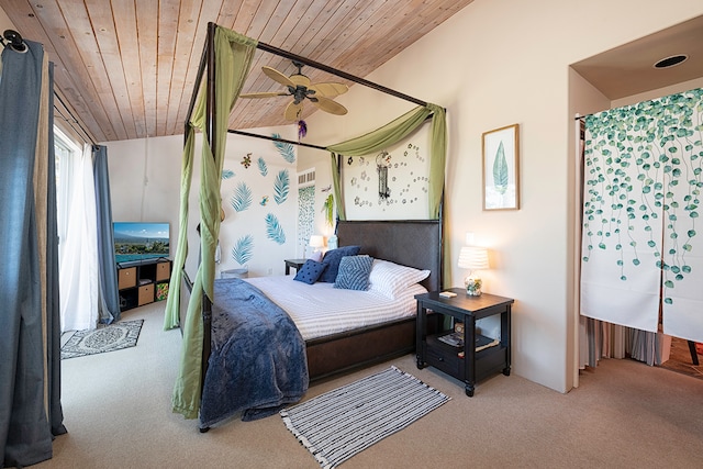 carpeted bedroom with ceiling fan, lofted ceiling, and wood ceiling