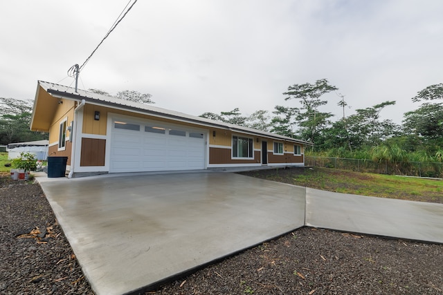 ranch-style home with a garage