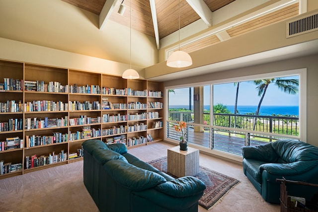 living area with beam ceiling, carpet flooring, a towering ceiling, a water view, and wood ceiling