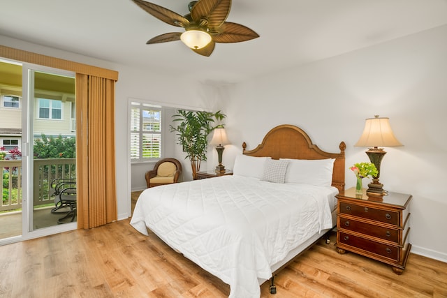 bedroom with access to outside, ceiling fan, and hardwood / wood-style flooring