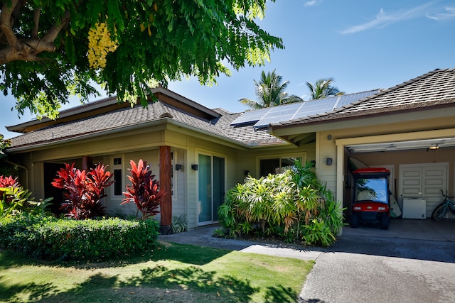 view of front of home with solar panels