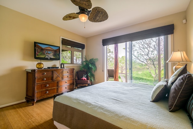 bedroom with ceiling fan and light wood-type flooring