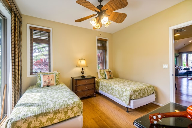 bedroom featuring ceiling fan and wood-type flooring