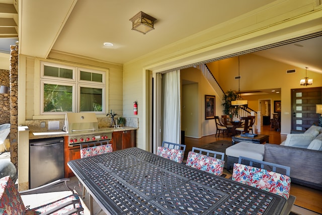 view of patio / terrace featuring a grill and exterior kitchen