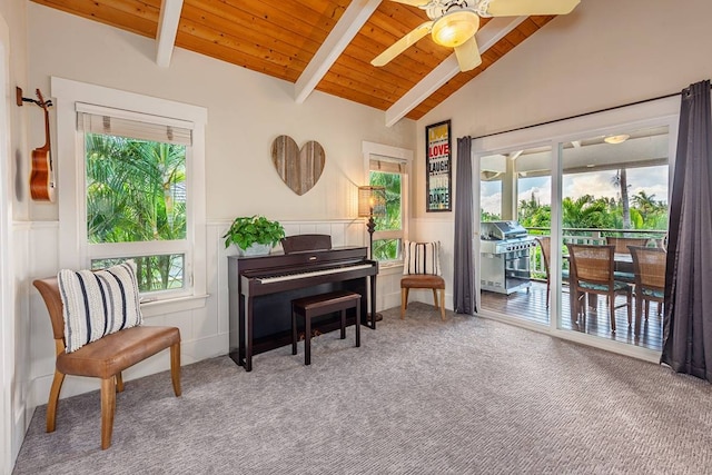 miscellaneous room featuring wood ceiling, ceiling fan, carpet, and lofted ceiling with beams