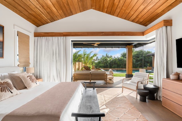 bedroom featuring light tile patterned floors, wood ceiling, and lofted ceiling