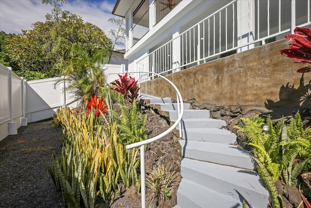 view of yard featuring a balcony