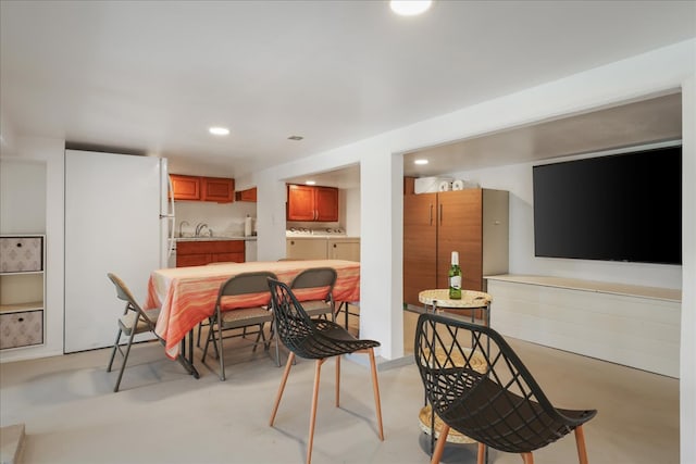 dining space featuring separate washer and dryer