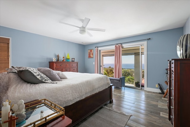 bedroom with access to outside, ceiling fan, and dark hardwood / wood-style flooring