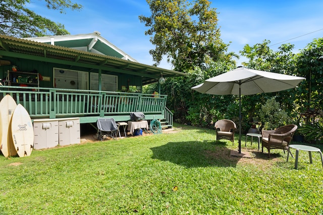 view of yard featuring a deck