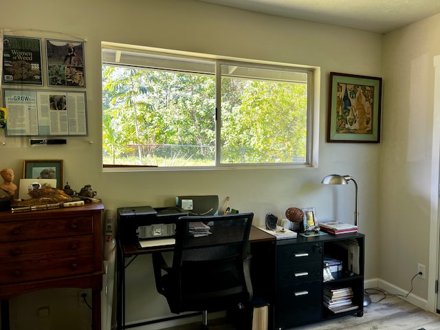 office area with light wood-type flooring