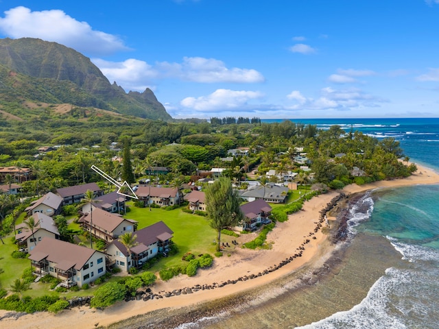 bird's eye view with a water and mountain view and a view of the beach